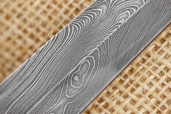 Close up on a traditional handmade Finnish knife made of damascus steel